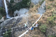 hanging off a bridge 100 m up